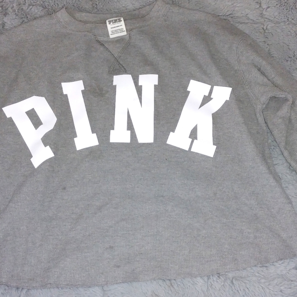 Pink sweater size xs.